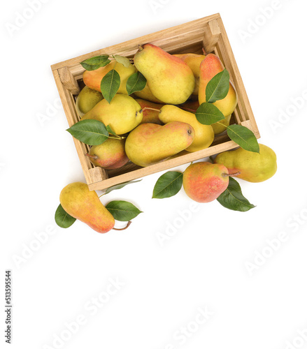 Delivery of fresh fruits and vegetables. Ripe pears in a wooden box. Isolated.