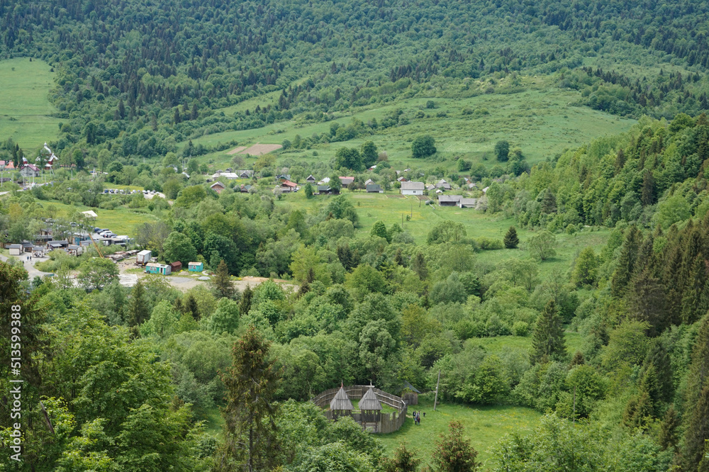View of a village with small houses in the Carpathian mountains.