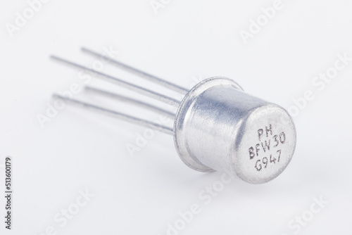 Wallpaper Mural Old metal transistor PH BFW30 G947 on white background. Electronic component. Vintage semiconductor device.  Torontodigital.ca