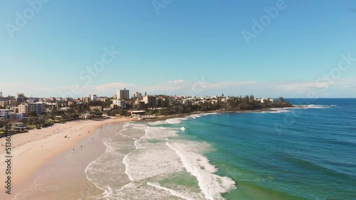 Aerial view of Kings Beach coastline at Sunshine Coast, Queensland on a beautiful, bright blue sky day.  photo