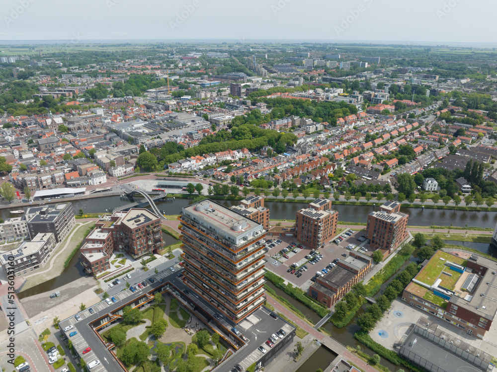 Purmerend urban city in north holland the Netherlands Holland, aerial drone overhead overview. City center summer sunny day. River buildings roads.