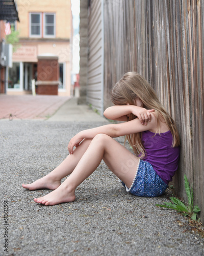 Sad Child Sitting Alone Crying Outside