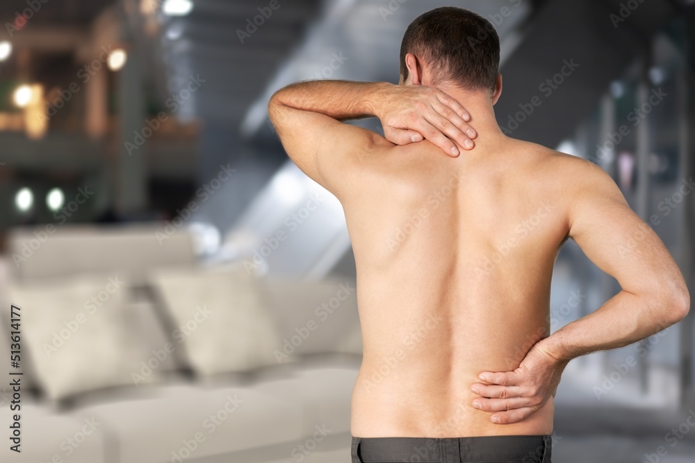 Back pain, kidney inflammation, man suffering from backache, health problems concept