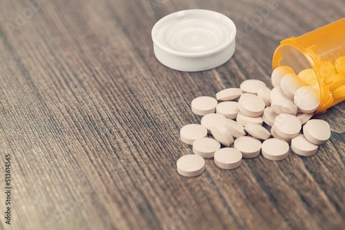 A pill is a medication in the nonsteroidal anti-inflammatory drug on the desk