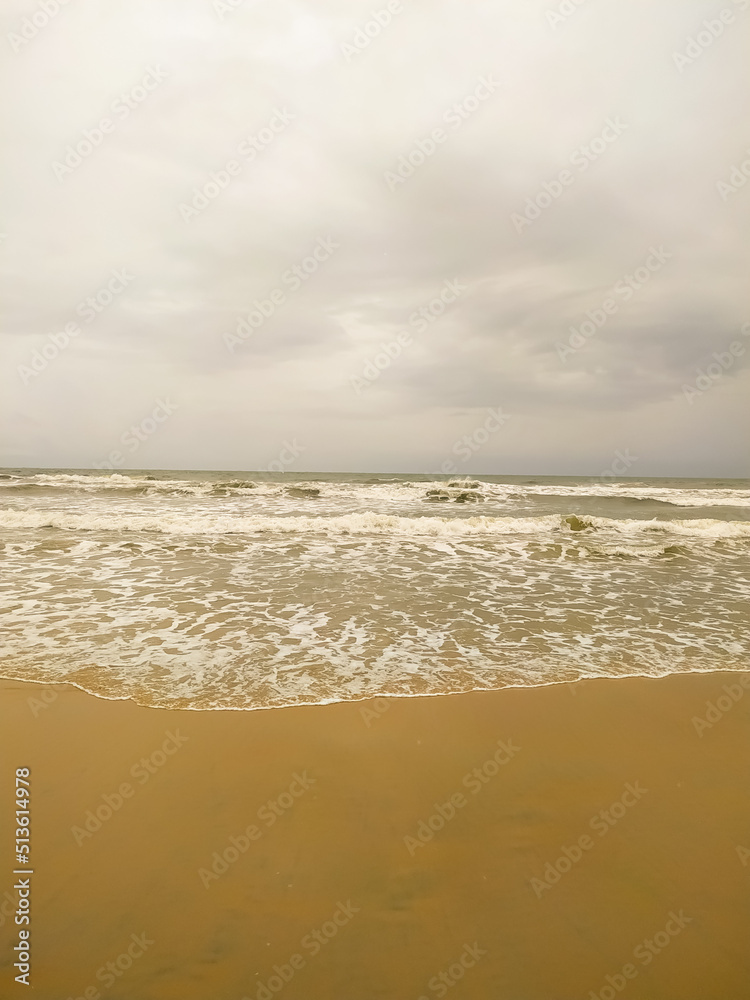 Wave of the sea on the sand