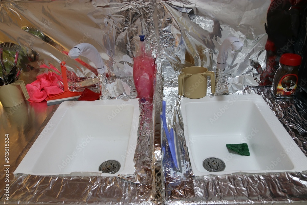 Sinks and marble are coated with foil and plastic in honor of Passover