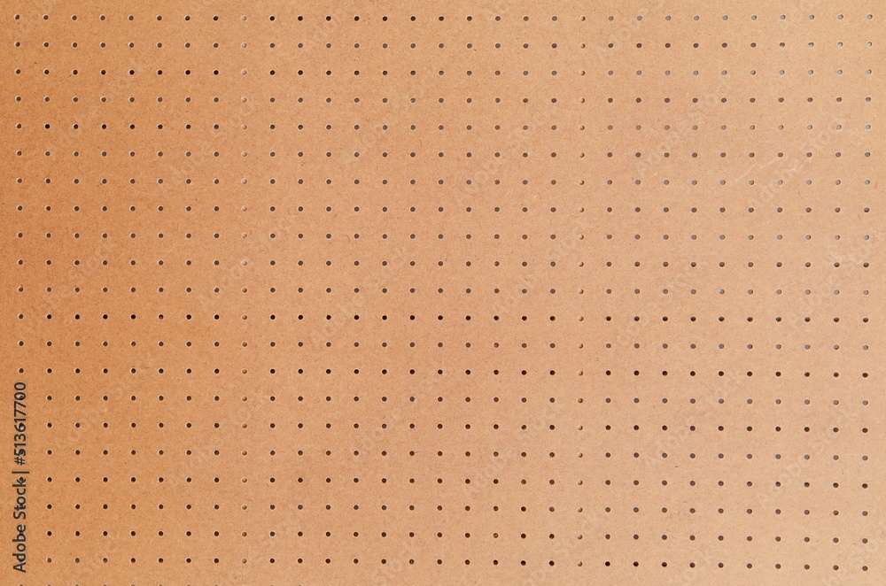 Large peg board background. Stock Photo | Adobe Stock