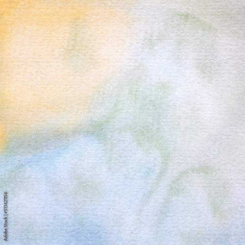 Watercolor abstract pattern background a handpainted watercolour with yellow, gold, green and blue shades.