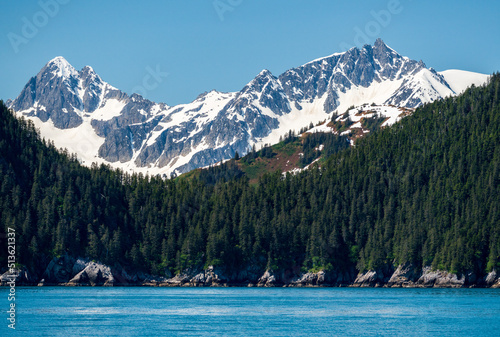 Snow covered peak of the mountain overlooking the port of Seward in Alaska