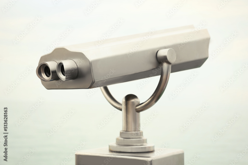 Metal tower viewer installed outdoors. Mounted binoculars Metal tower viewer installed outdoors. Mounted binoculars