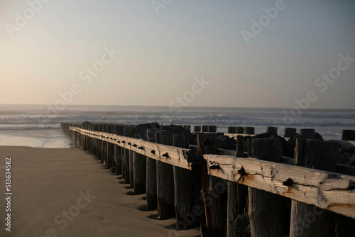 Sandy beach and an ocean view during sunset