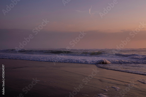 Beach waves at sundown 