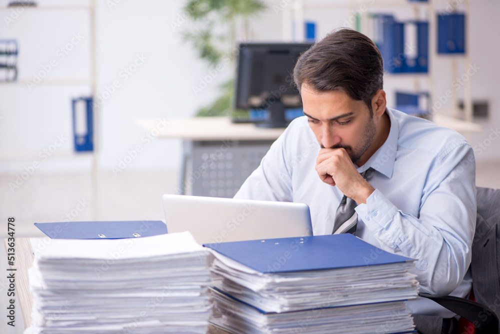 Young businessman employee working in the office Young businessman employee working in the office