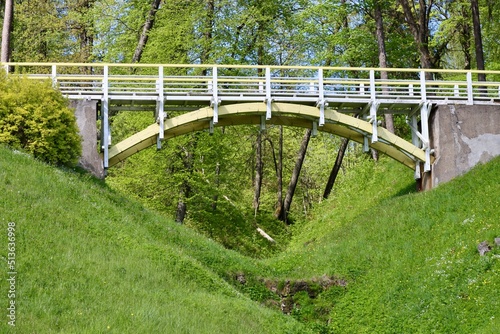 Wooden pedestrian bridge in Temple hill park in Aluksne town  Latvia