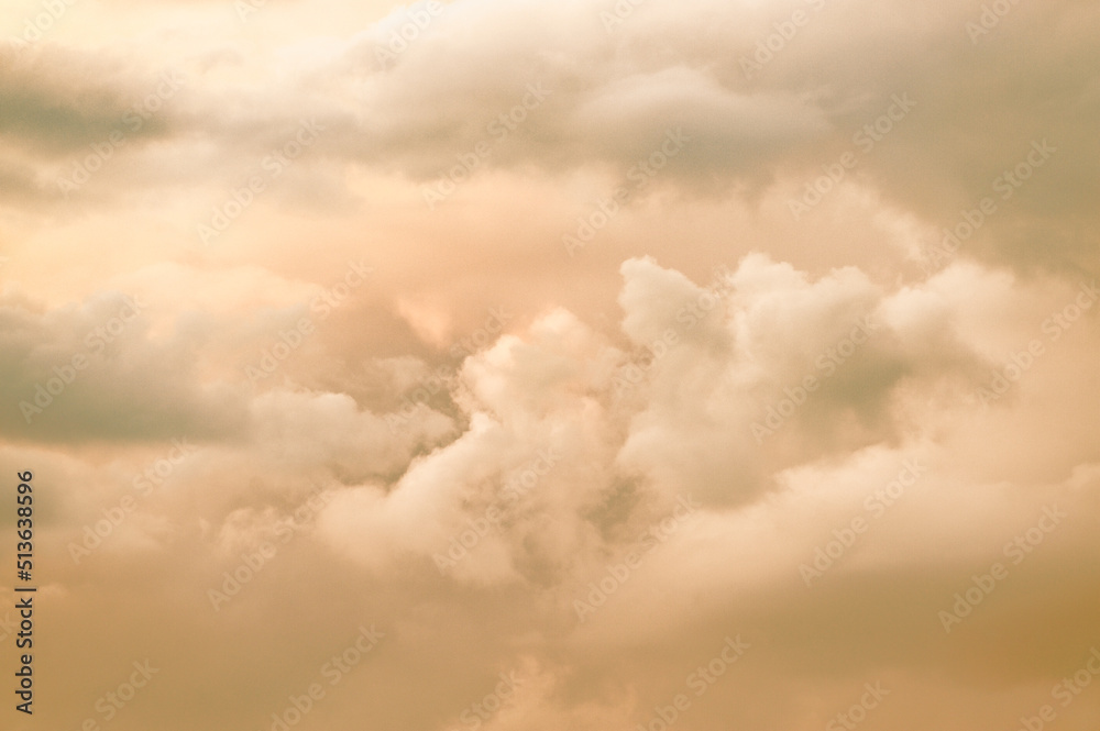 Pastel coloured colored evening cumulus sky clouds. Pink and grey gray colors colours