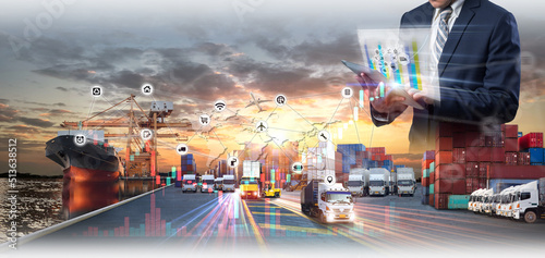 Smart technology logistics concept,  Businessman touching virtual screen world map of Global logistics network distribution, Air cargo trucking, Rail transportation, Online goods orders worldwide