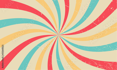 Retro sunburst vector background with a vintage color palette of blue yellow red and beige in a spiral or swirled radial striped design. Colourful grunge circus backdrop. © Регина Гафарова