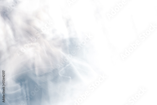 The image of the sky-colored smoke spreading over a white surface.