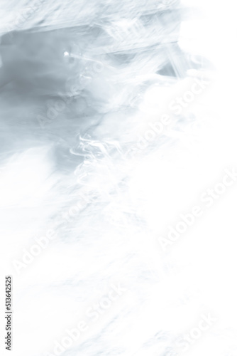 The image of the sky-colored smoke spreading over a white surface.
