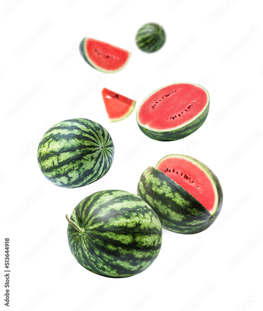 Watermelon with cut half slice flying in the air isolated on white background. Watermelon with cut half slice flying in the air isolated on white background.