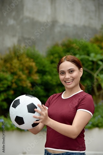 Sporty Minority Female And Happiness With A Ball Outside