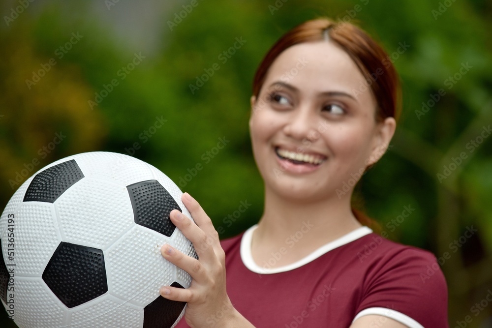 Redhead Female And Happiness With A Ball At Park