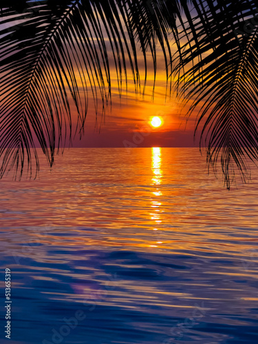 Beautiful sunset at a beach resort in the tropics © EwaStudio