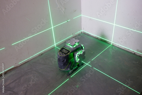 the laser level marks the lines for marking on the construction site