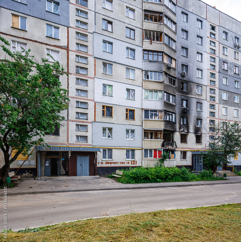 Destroyed and burned apartments in a multi-storey residential building. Residential area Saltovka. War in Ukraine.