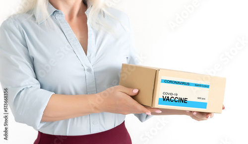 Close up of paper boxes with coronavirus vaccine, copy space, world pandemic, covid-19, quarantine, panorama.