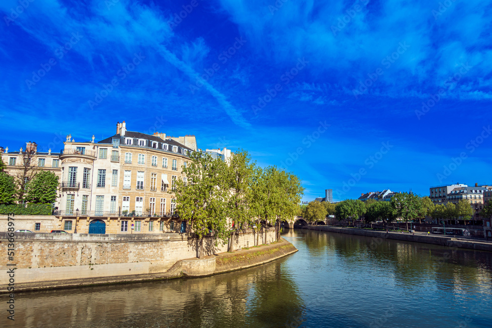 PARIS, FRANCE - APRIL 8, 2022: Street view of river Seine in Paris city, France.