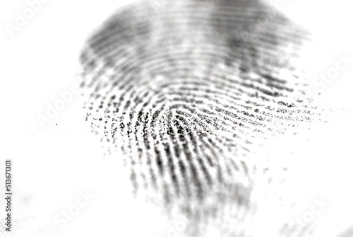 Selective focus of a paper impression of a fingerprint on a white background, concept of criminology and police science photo