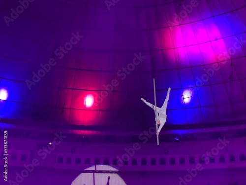 the circus.  man equilibrist under the dome of the circus.