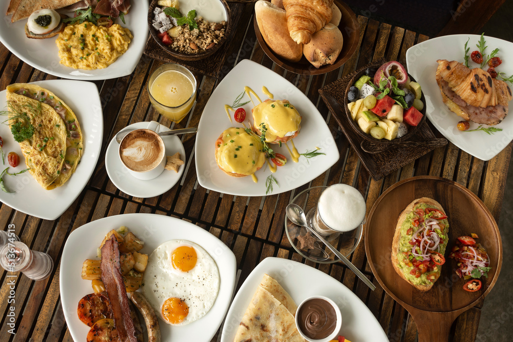 many mixed western breakfast food items on cafe table many mixed western breakfast food items on cafe table