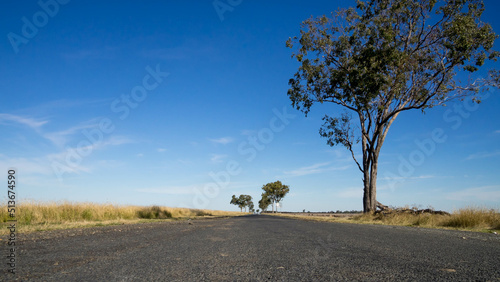 Low angle view of country road and sky photo