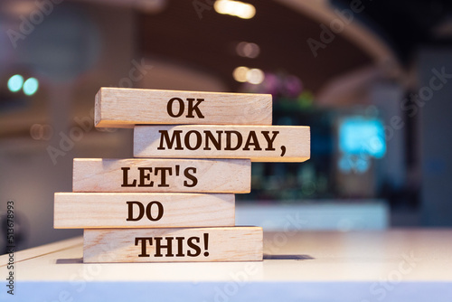 Wooden blocks with words 'Ok Monday, Let's do this!'.