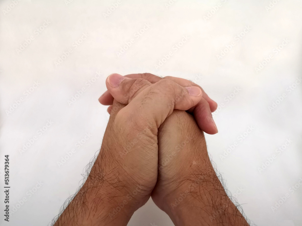 Fototapeta premium Man's hand. Praying Hands Isolated on white background.