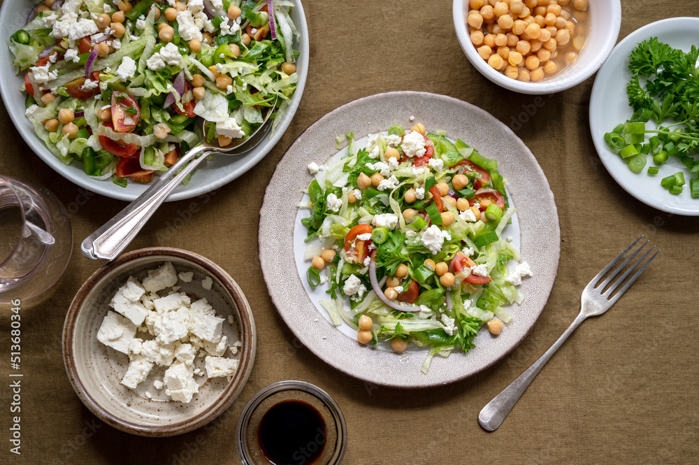 Healthy cabbage salad with tomatoes, parsley, onions, salad cheese, chickpeas. Detox, healthy food Healthy cabbage salad with tomatoes, parsley, onions, salad cheese, chickpeas. Detox, healthy food