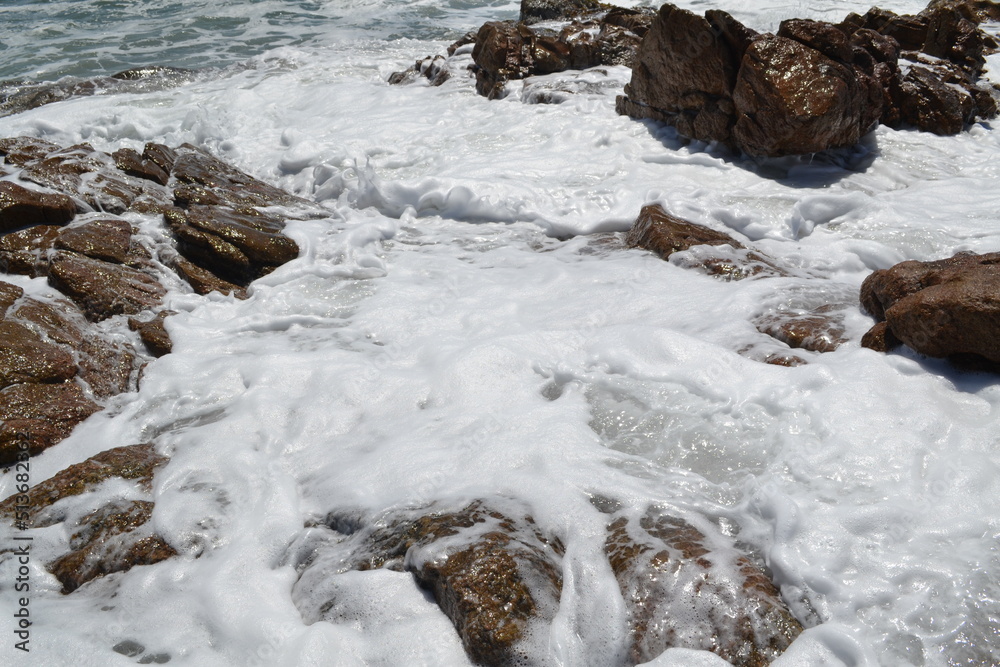 water surrounding rocks