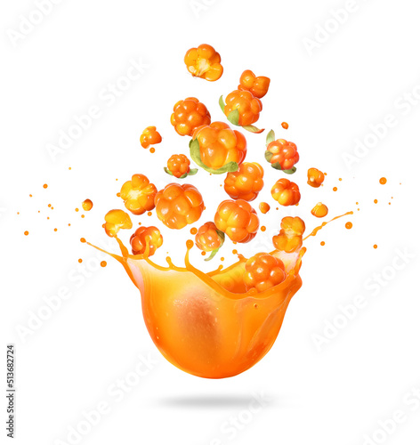 Ripe cloudberry in splashes of fresh juice on a white background photo