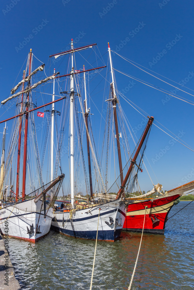 Historic tall ships on the IJssel river in Kampen, Netherlands