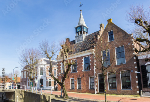 Historic town hall at the canal in Balk, Netherlands