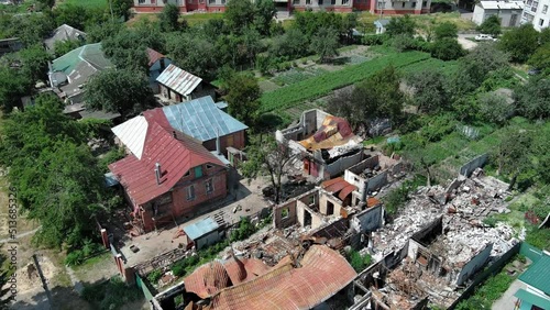 Chernihiv, Ukraine - June 27, 2022: War in Ukraine. Damaged ruined houses in ukrainian city Chernihiv near Kyiv on north of Ukraine. Ruins during War of Russia against Ukraine. photo