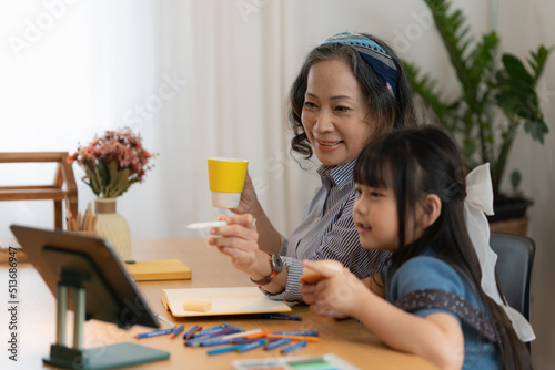 Happy moment of Daughter enjoying time together with mother at home. little child girl having fun. © itchaznong