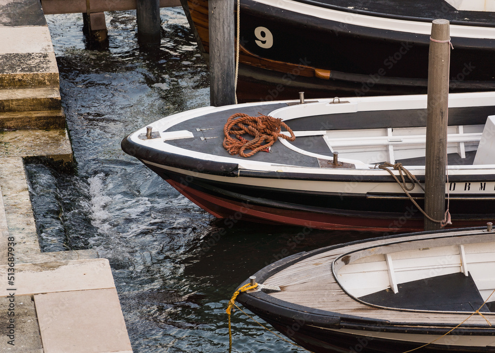 Boats docked by the lagoon in Venice, Italy 