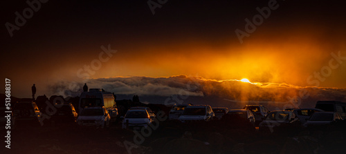 sunset over the cars