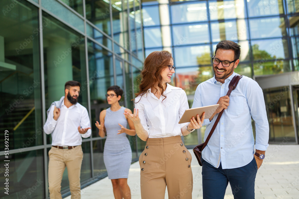 Group of business people using a digital tablet together, meeting and teamwork concept. Group of business people using a digital tablet together, meeting and teamwork concept.