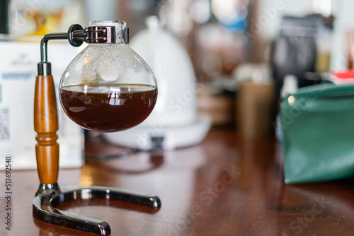 Making coffee with syphon method
