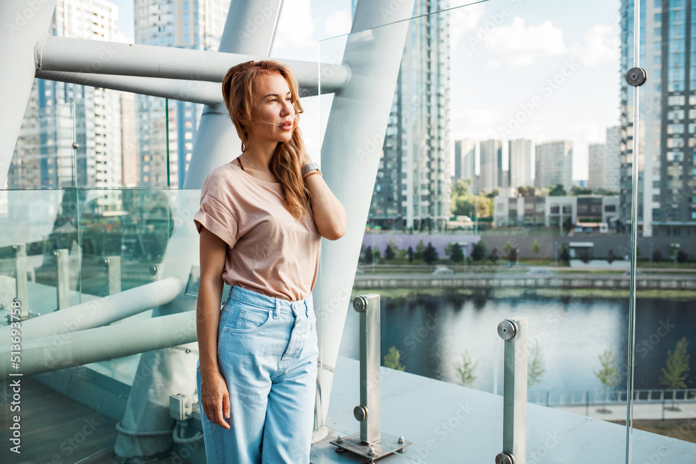 Fototapeta premium person standing on bridge