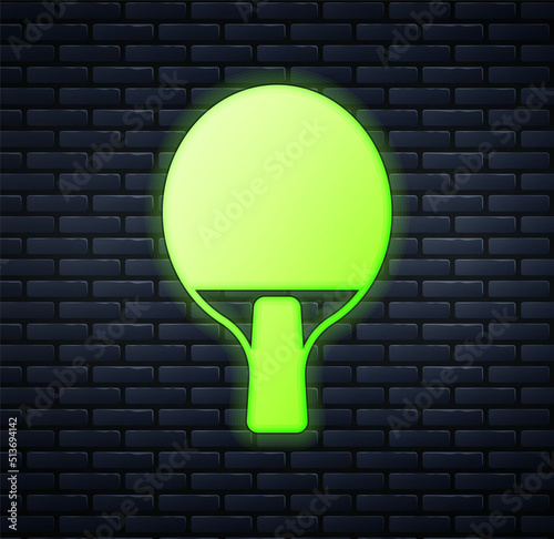 Glowing neon Racket for playing table tennis icon isolated on brick wall background. Vector